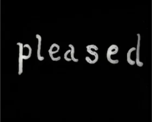 the word 'pleased' in a white font on a black background
